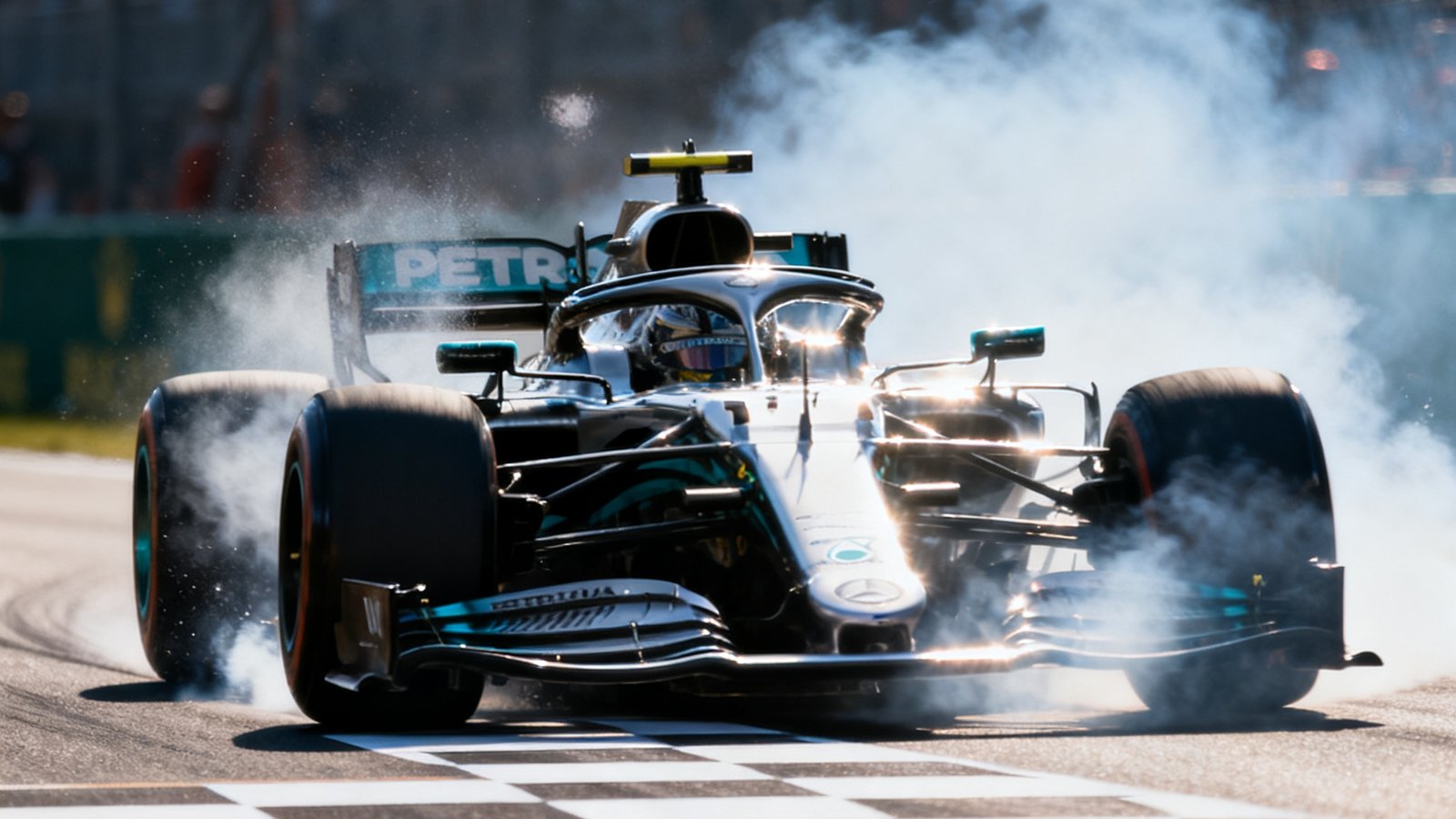 F1赛车在终点线前全力冲刺，轮胎与地面摩擦冒出白烟，身后是模糊的观众围栏